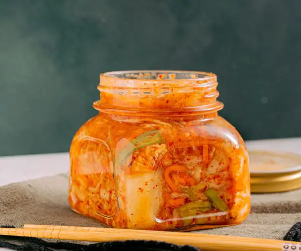 does kimchi make you poop